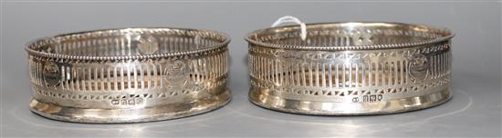 A pair of George V pierced silver wine coasters by Harry Freeman, London, 1911,